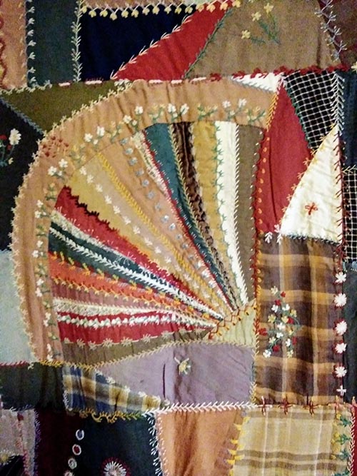 Great Grandmother's colorful quilt closeup